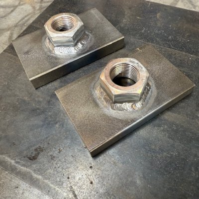 Welding nut to fixture plate