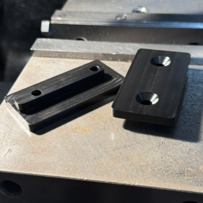 Machining Delrin plastic sliding plates