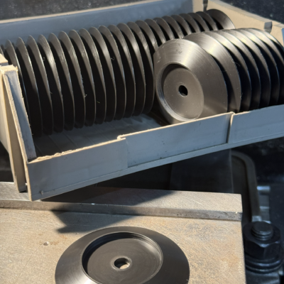 Machining tapered corner washers for guiding the chain